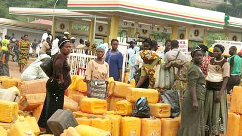 Traders queue at a Filling station due to the lingering fuel scarcity in Lagos