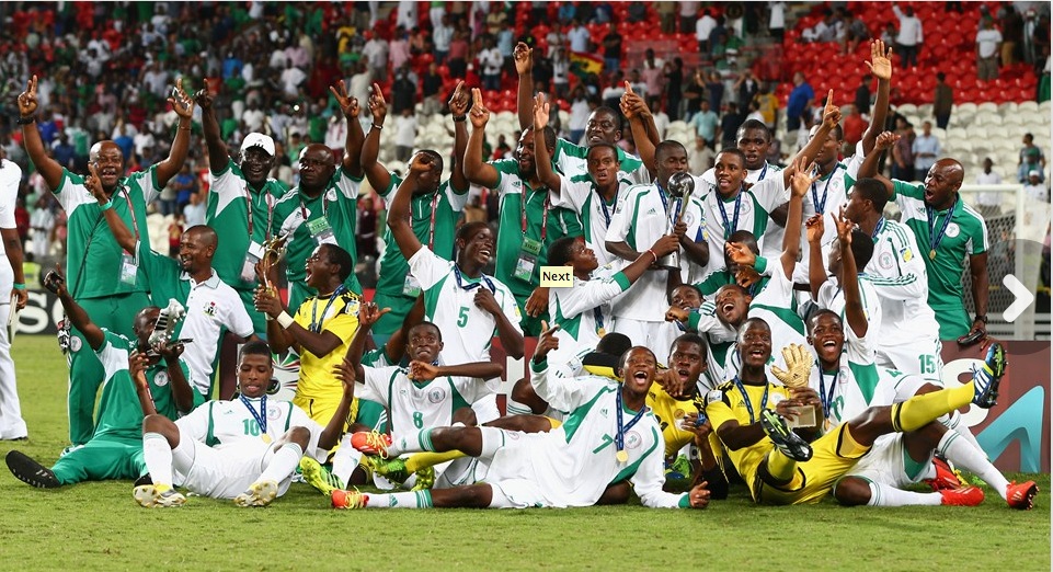 Members of the victorious Nigerian U-17 team pose with their trophies at the Mohamed Bin Zayed Stadium on November 8, 2013 in Abu Dhabi, United Arab Emirates.(Photo: FIFA via Getty Images)